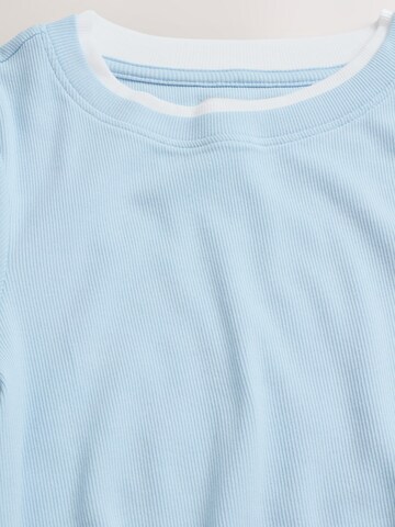 Next - Camiseta en azul