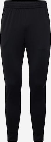 Tapered Pantaloni sportivi 'Tenacity' di new balance in nero: frontale