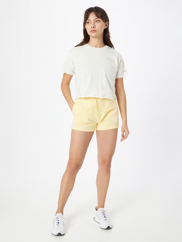 Champion Authentic Athletic Apparel Regular Pants in Yellow