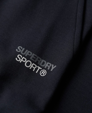 Coupe slim Pantalon de sport Superdry en bleu