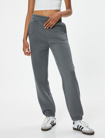 Koton Tapered Trousers in Grey: front