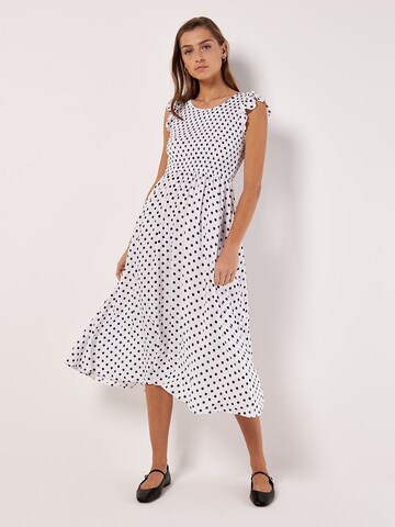 Robe Apricot en blanc