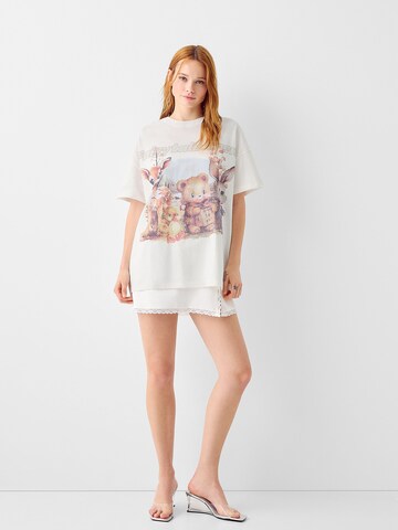 Bershka Koszulka oversize w kolorze beżowy