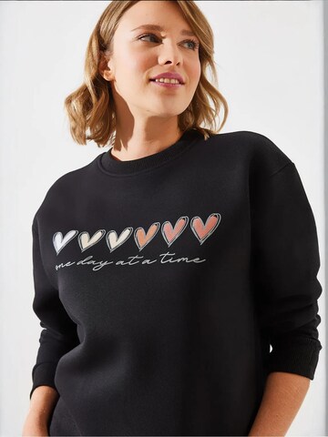 Felpa di Bianco Lucci in nero