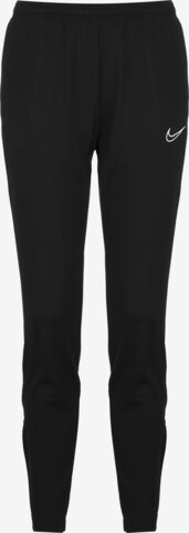 NIKE Skinny Workout Pants in Black: front