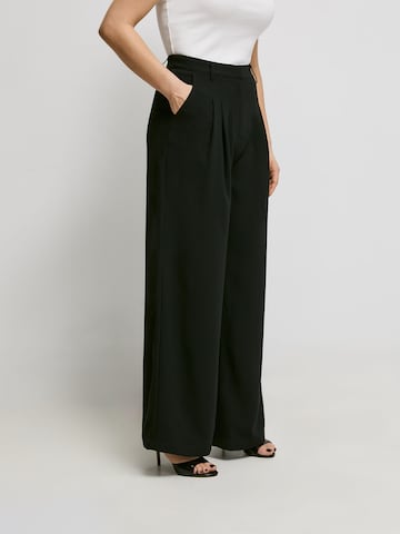 ABOUT YOU x Iconic by Tatiana Kucharova Loose fit Pleat-Front Pants 'Mathilda' in Black