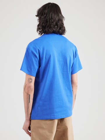 Nike Sportswear - Camiseta 'Premium Essentials' en azul