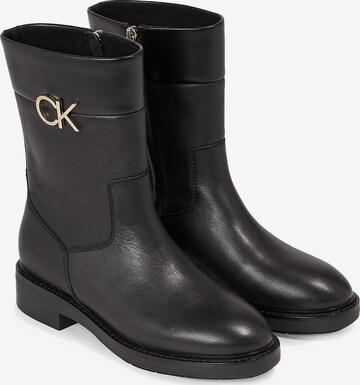 Botine de la Calvin Klein pe negru