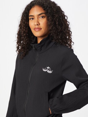 ADIDAS ORIGINALS Jacke in Schwarz