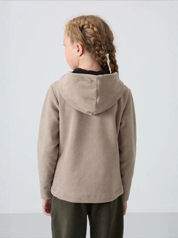 Tommy Life Dressipluus 'TOMMY Unisex-Kapuzen-Sweatshirt Für Jugendliche Mit Reißverschluss', värv beež