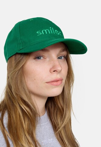 smiler. Cap in Green: front