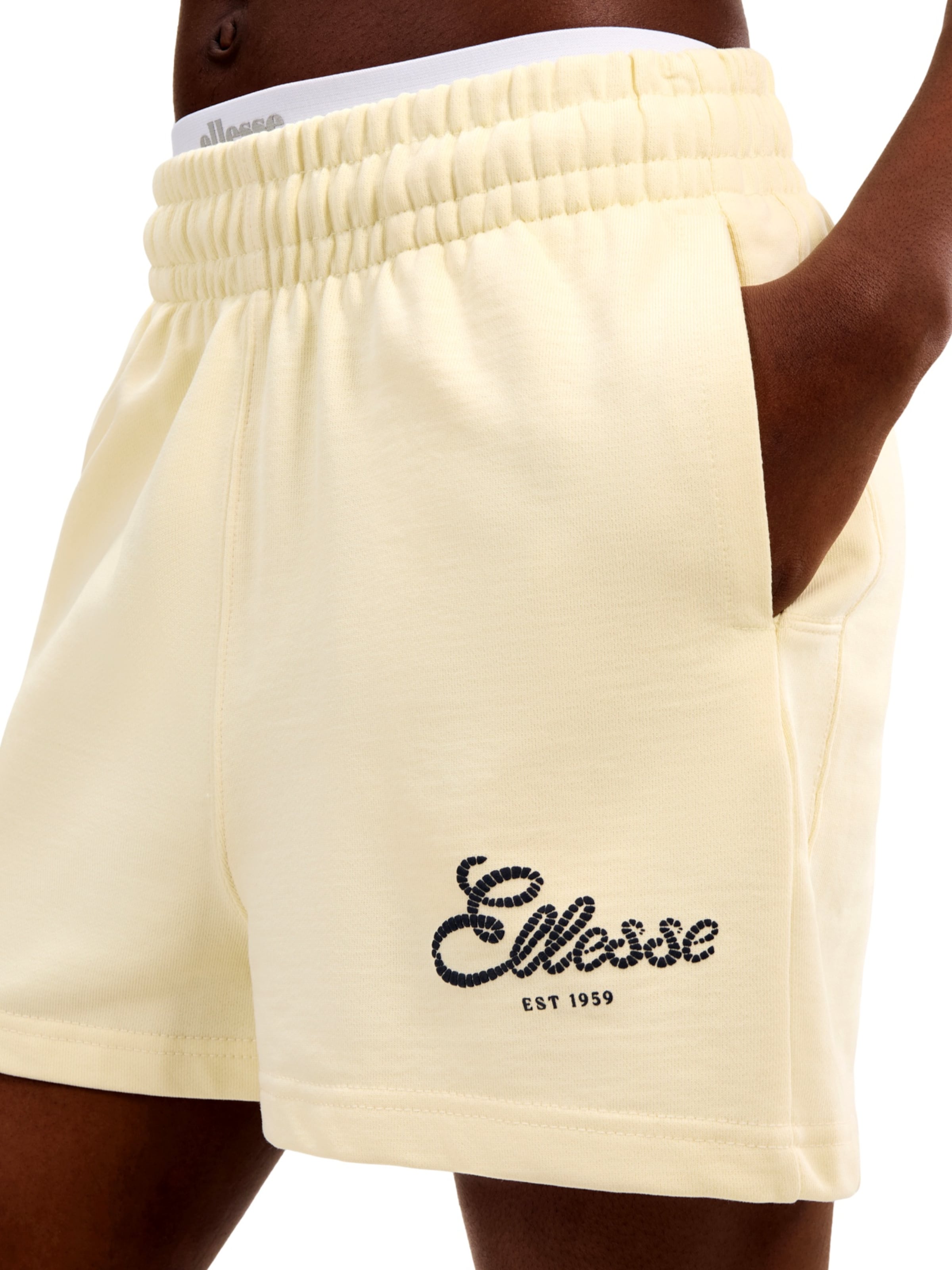 Loosefit Pantaloni sportivi di ELLESSE in giallo