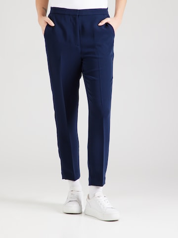 Slimfit Pantaloni con piega frontale di TOMMY HILFIGER in blu: frontale