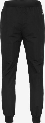 Effilé Pantalon de sport PUMA en noir