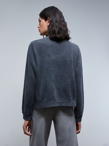 Sweat-shirt Scalpers en gris