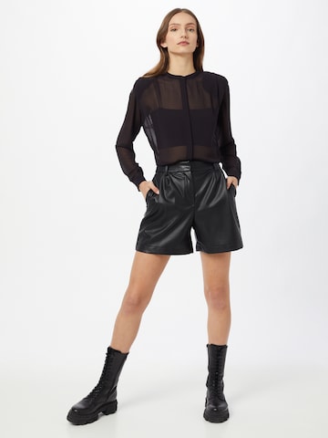 NU-IN - Blusa en negro