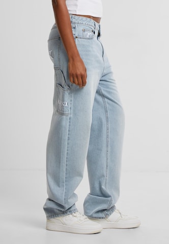 Tapered Jeans di Karl Kani in blu