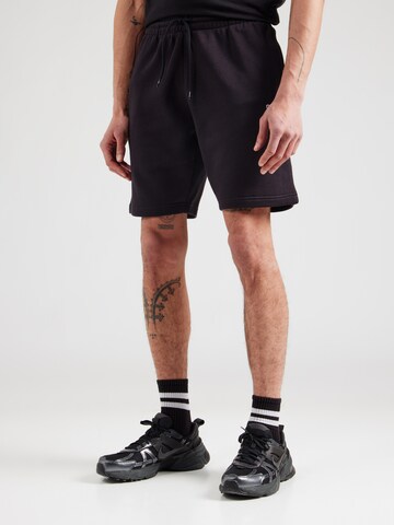 Reebok regular Παντελόνι φόρμας 'Identity' σε μαύρο: μπροστά