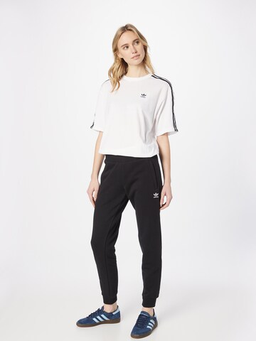 ADIDAS ORIGINALS Tapered Pants 'Adicolor Essentials' in Black | ABOUT YOU