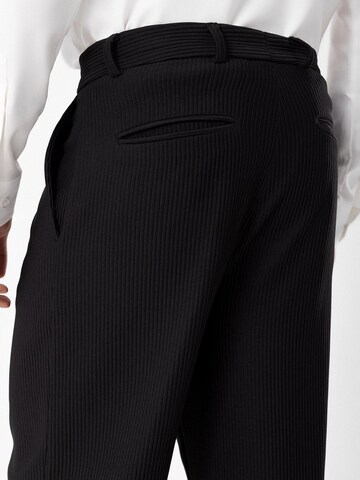 Antioch Loose fit Pleat-front trousers in Black