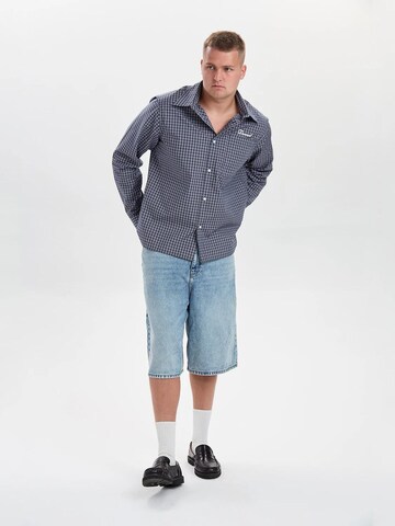 Dxnmxrk - Pierna ancha Vaquero 'DXHarri Blue Wide Fit Denim Shorts' en azul