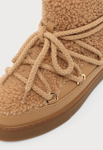 INUIKII - Botas de nieve 'CURLY' en beige