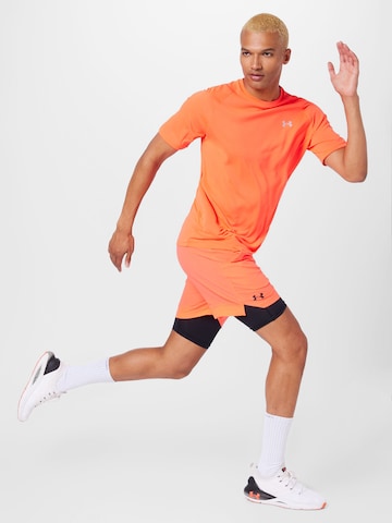 UNDER ARMOUR Regular Workout Pants 'Vanish' in Orange