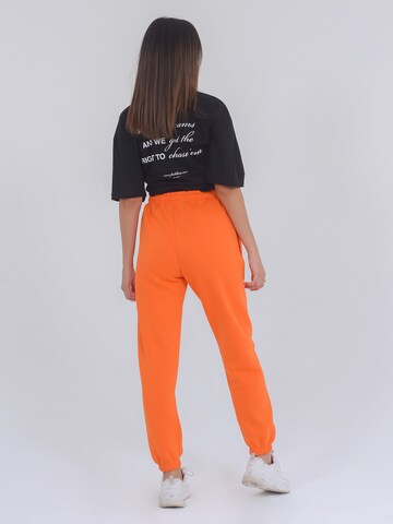 Effilé Pantalon ' Dalina ' FRESHLIONS en orange