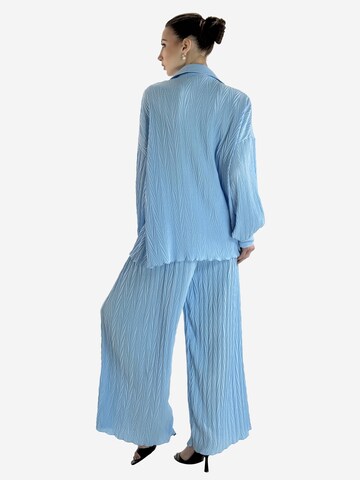 Elara Buksedragt i blå