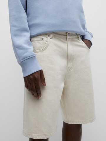 Pull&Bear Lużny krój Jeansy w kolorze beżowy