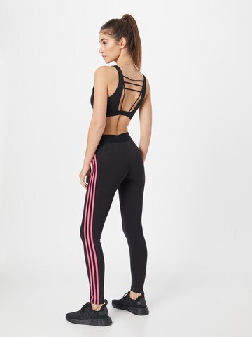 ADIDAS SPORTSWEAR Skinny Fit Спортен панталон 'Essential' в черно