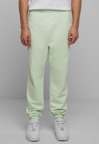 Tapered Pantaloni di Urban Classics in verde: frontale