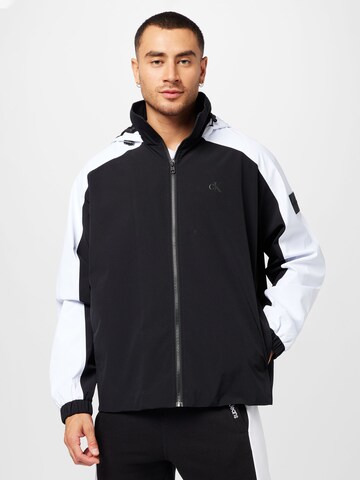 Calvin Klein Jeans Between-season jacket in Black: front