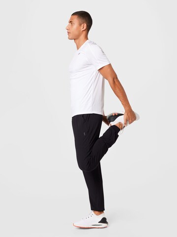 Effilé Pantalon de sport CURARE Yogawear en noir