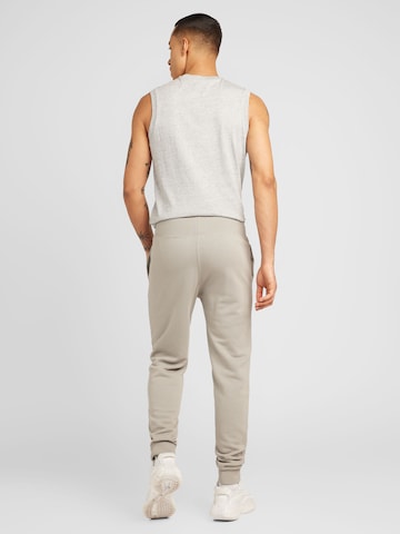 Champion Authentic Athletic Apparel Tapered Broek 'Legacy' in Grijs