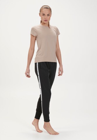 Athlecia Functioneel shirt in Beige