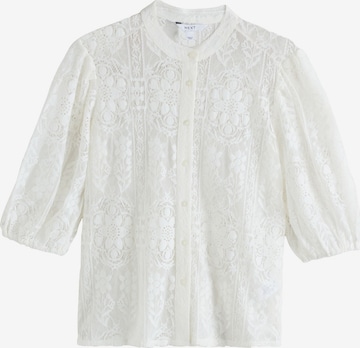 Next Pusero värissä beige: etupuoli