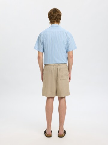 Loosefit Pantaloni 'SLHMAGNUS' di SELECTED HOMME in beige
