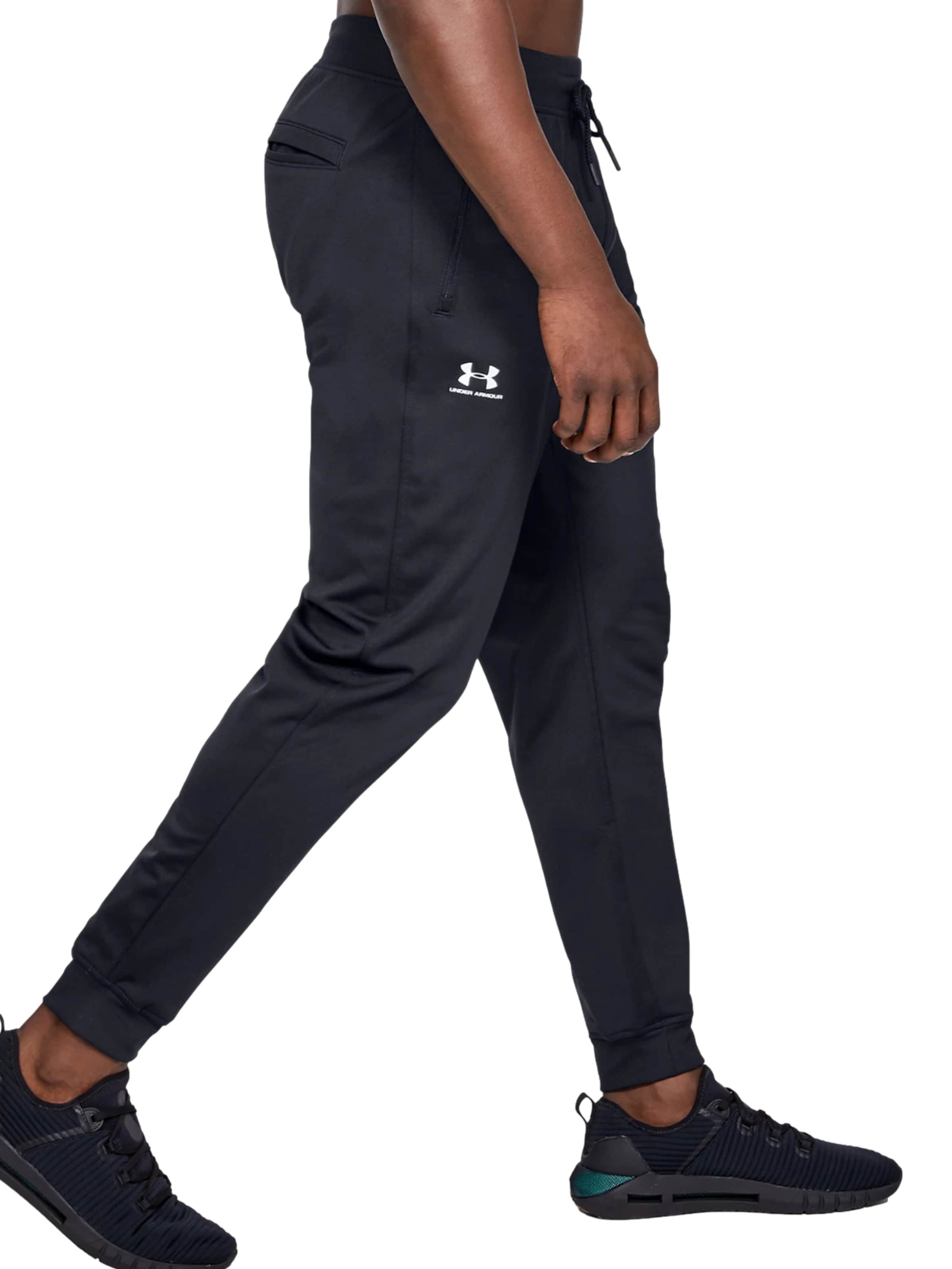 Loosefit Pantalon de sport 'Sportstyle' UNDER ARMOUR en noir