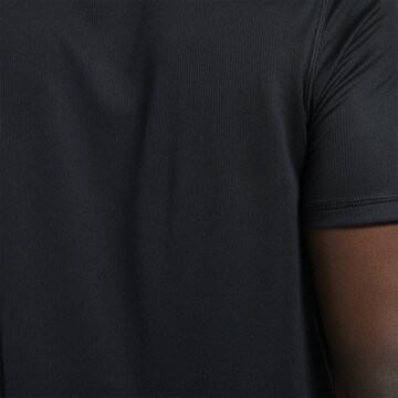 T-Shirt fonctionnel Reebok en noir