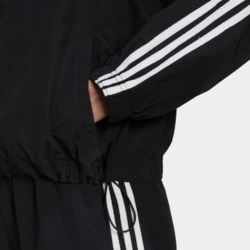 ADIDAS SPORTSWEAR Sportovní bunda 'Essentials Repeat' – černá