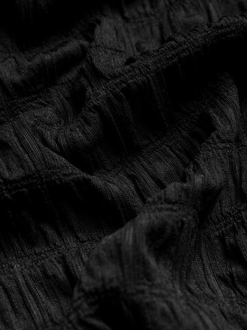 Robe Next en noir