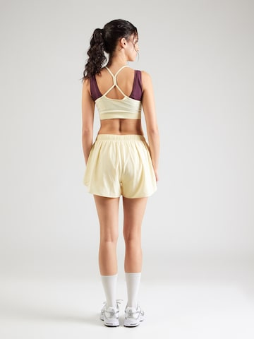 regular Pantaloni sportivi di ICANIWILL in giallo