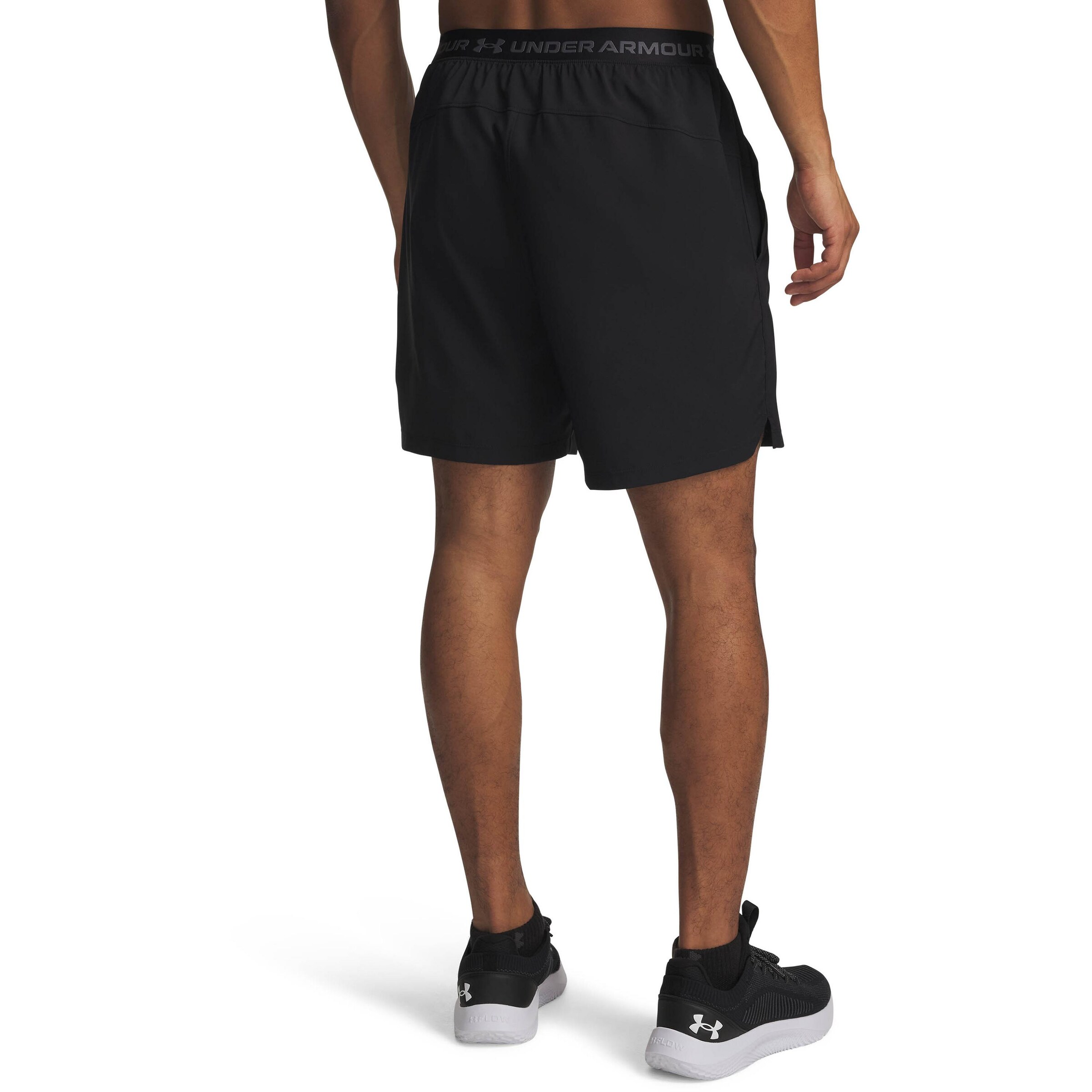 UNDER ARMOUR Regular Workout Pants in Black