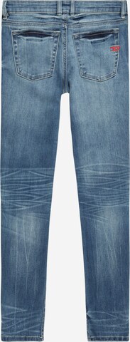 DIESEL גזרת סלים ג'ינס בכחול