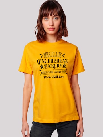 T-shirt 'Santas Gingerbread Bakery' F4NT4STIC en jaune : devant