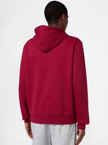 Champion Authentic Athletic Apparel Sweatshirt in Red