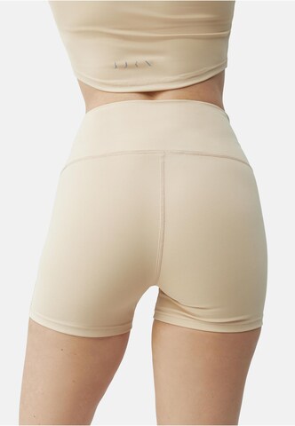 Born Slim fit Trousers with creases 'Sayani' in Beige
