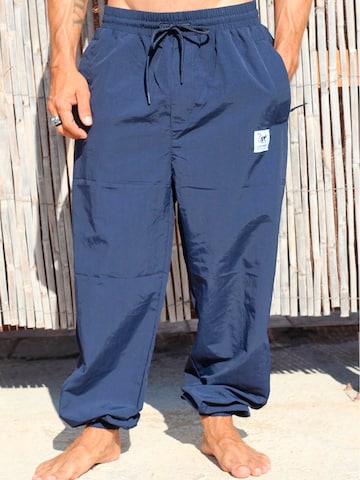 Surf Monkey - Loosefit Pantalón funcional en azul