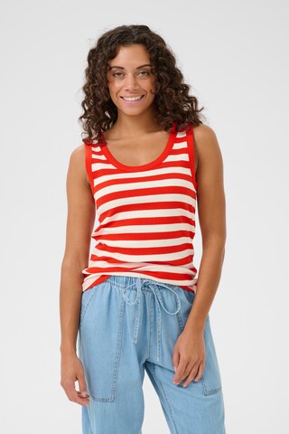 CULTURE - Top en rojo: frente